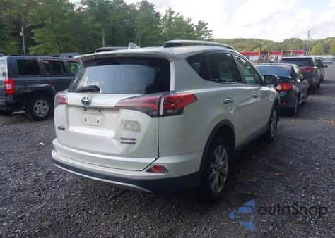 2016 Toyota Rav4 Hybrid Limited z USA, uszkodzony, nr VIN JTMDJREV3GD053897
